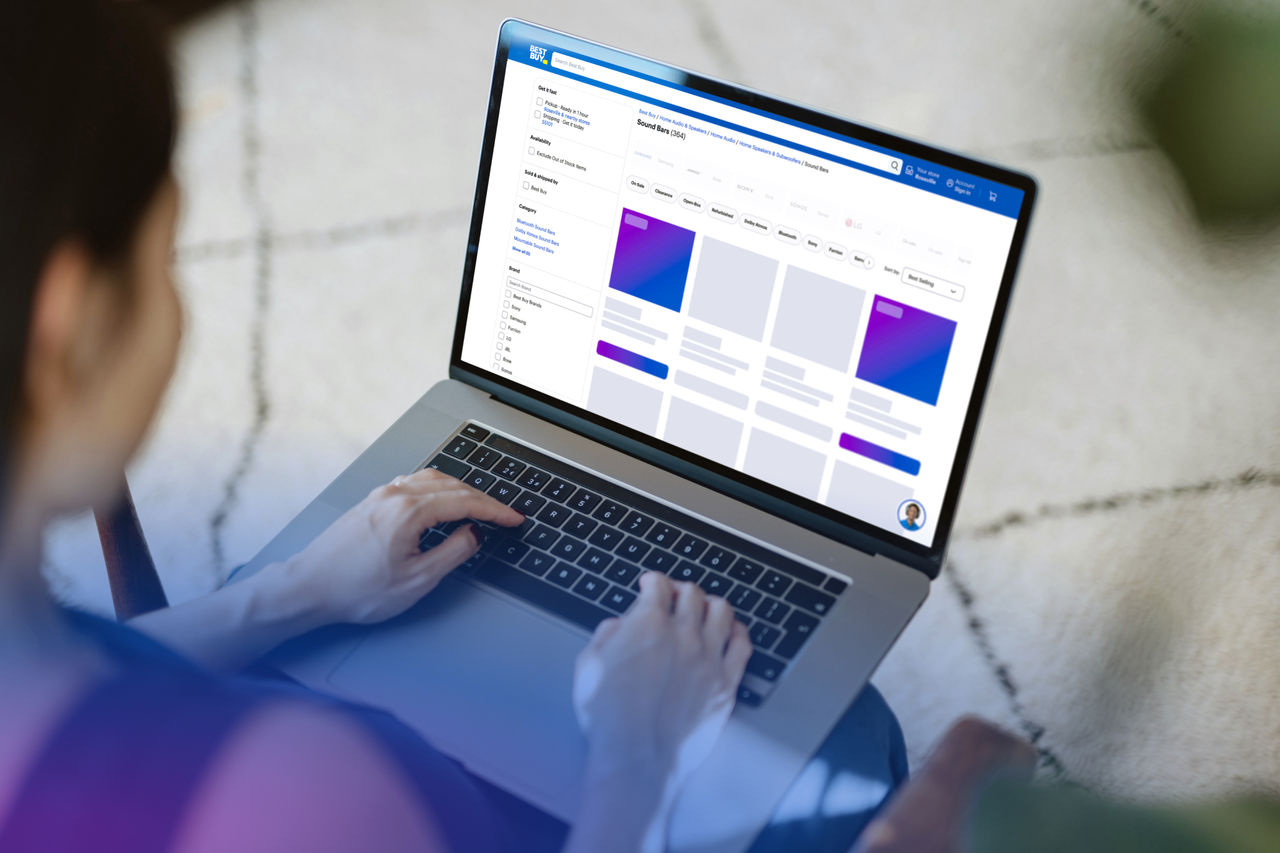 Sponsored Products screen on both a smart phone and laptop on a desk. 