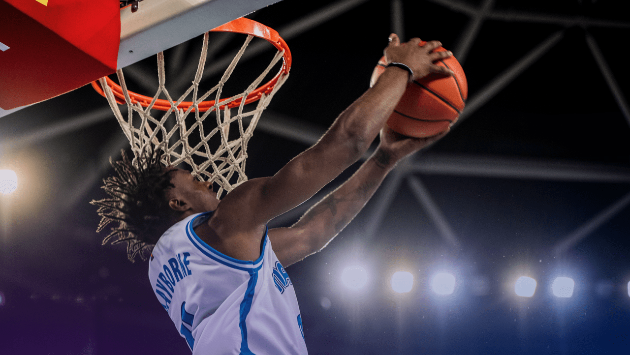 basketball player dunking the ball