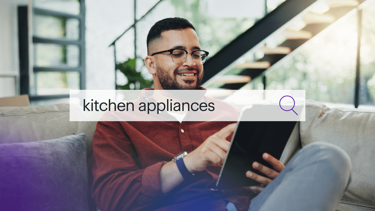 person using a tablet with a text overlay search graphic "kitchen appliances"