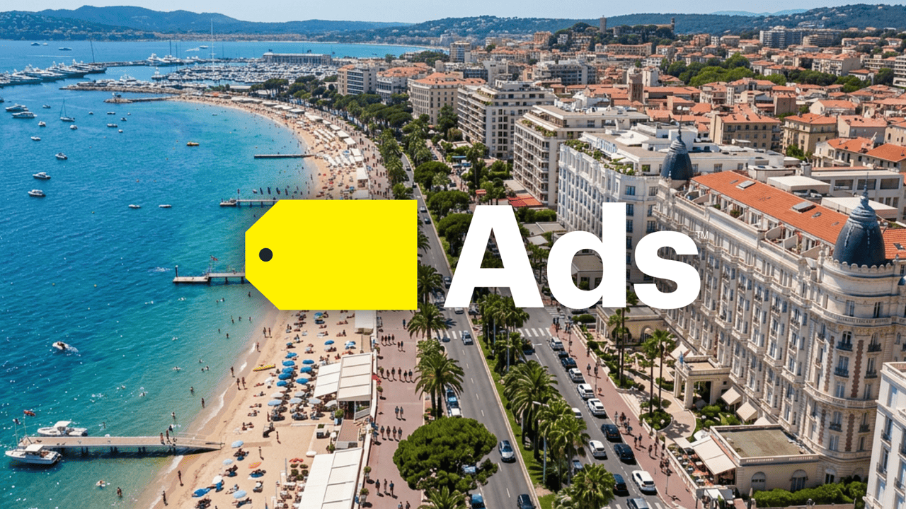 Arial view of Cannes France with Best Buy Ads logo displayed over the image. 